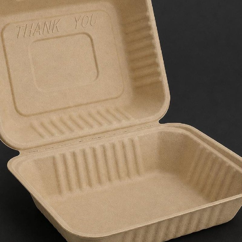 Compostable bagasse clamshell container